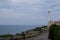 Santa Maria di Leuca, Italy. Iconic lighthouse located next to Basilica De Finibus Terrae where the Adriatic and Ionian seas meet.