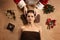 Santa masseur make SPA treatment for young beautiful woman.