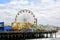SANTA MONICA, CALIFORNIA - 15 MAY 2021: Pacific Park, an oceanfront amusement park on the Santa Monica Pier, looks directly out on