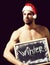 Santa muscular man with winter blackboard