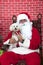 Santa Paws with white puppy dog