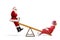 Santa playing on a seesaw with a funny clown