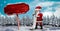 Santa reading list and Wooden signpost in Christmas Winter landscape