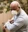 Santa Rosa, CA / USA April 9, 2020 - African American Man with medial protective mask outside. Concept of Lockdown, Flatten the