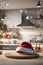 Santa\\\'s hat on top of a table in a kitchen, Christmas wallpaper