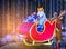 Santa`s sleigh with Christmas gifts boxes with bows and Christmas tree. Merry Christmas and Happy New Year. Polar bear is rides r