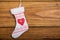 Santa sock hang on white wood