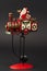 Santa on a steam train Christmas tree toy on dark background with copy space