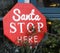 Santa stop here sign in new year tree