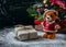 Santa Teddy Bear, Gift box wrapped linen cloth and decorated with cord, christmas decoration on brown vintage wooden boards backg