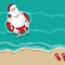 Santa on vacation in an inner tube