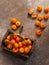 Santang oranges in a small wooden box