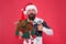 Santas favorite deer. Happy hipster give like with reindeer toy. Bearded man show thumbs up like hand. Like from Santa
