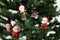 Santas on pine tree