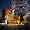 Santas present sack with gift boxes outdoor