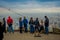 SANTIAGO, CHILE - OCTOBER 16, 2018: Group of tourists enjoying the gorgeous view from Cerro San Cristobal in Santiago de