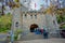 SANTIAGO, CHILE - OCTOBER 16, 2018: Unidentified people at the enter of stoned building doing the line to buy tickets to