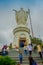 SANTIAGO, CHILE - OCTOBER 16, 2018: Unidentified people walking close to the statue of the Virgin Mary on the top of the