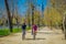 SANTIAGO, CHILE - SEPTEMBER 13, 2018: Blurred picture of tourists biking and walking in a sunny day for relaxing in the