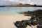 Santiago island seen from the beach of Chinese Hat island, Gala