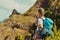 Santo Antao island, Cabo Verde. Woman tourist with backpack enjoy the view during the hike in arid terrain