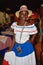 Santo Domingo, Dominican Republic. Girl in traditional Dominican dress. El Conde Street, Colonial Zone.