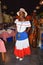 Santo Domingo, Dominican Republic. Girl in traditional Dominican dress. El Conde Street, Colonial Zone.