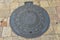 Santo Domingo, Dominican Republic. Manhole cover for telecommunications inspection.