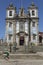 Santo Ildefonso church, with skater doing tricks