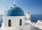 Santorini - Anastasi church in Imerovigli with the Nea Kameni island in background.