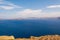 Santorini coast and blue sea.