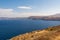Santorini coast and blue sea.