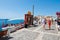 SANTORINI,FIRA-JULY 28:Tourists enjoy view next to Fira Cathedral on July 28,2014 in Fira town on the Santorini island, Greece.