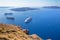 SANTORINI, GREECE - OCTOBER 7, 2015: The outlook over the clifs to caldera with the cruises and Nea Kameni Island