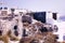 Santorini, Greece : Wide angle of an exterior of Andorini`s luxury suite hotel in Thira Oia overlooking the