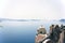 Santorini, Greece : Wide angle view of typical Church dome in Firostefani village and sea view with mountains