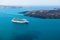 Santorini island, Greece. Cruise ship near the coast