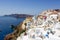 Santorini island holidays in Greece travel traveling Oia town Mediterranean Sea with windmills Santorin