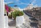 Santorini - look beautifull with the flowers decored house and little typically white-blue church in Oia.