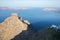 Santorini - The look to l Skaros castle with the little church Agios Joannis Apokefalistheis and Therasia island and Oia