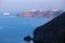 Santorini - Look to Oia across the cliffs in morning light.