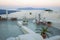 Santorini - The outlook from Fira to caldera with Nea Kameni Island in morning dusk.