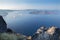 Santorini - The outlook over the Imerovigili to caldera with the cruises and Nea Kameni Island