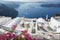 Santorini - outlook over the luxury resort in Imerovigili to caldera with the cruises.