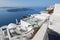 Santorini - outlook over the luxury resort in Imerovigili to caldera with the cruises.