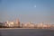 Santos Beach and city skyline at sunset with full moon - Santos, Sao Paulo, Brazil