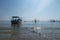 Sanur, Bali, Indonesia - February 7, 2021: Sanur beach in the morning. The activities of anglers and fishermen. Fishing boats