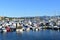 Sanxenxo, Spain. October 2018. Sailing and fishing industry in a small coastal village: Boats in a pier. Sunny day.
