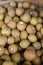 Sapodilla, known locally as Chico, for sale at a fruit stall in a public market in the Philippines