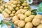Sapodilla, tropical fruit displayed at Vinh Long fruit market, Mekong delta. The majority of Vietnam`s fruits come from the many